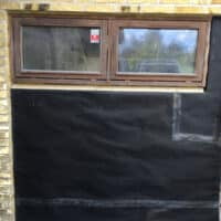 Isætning af vindue og isolering af garageport